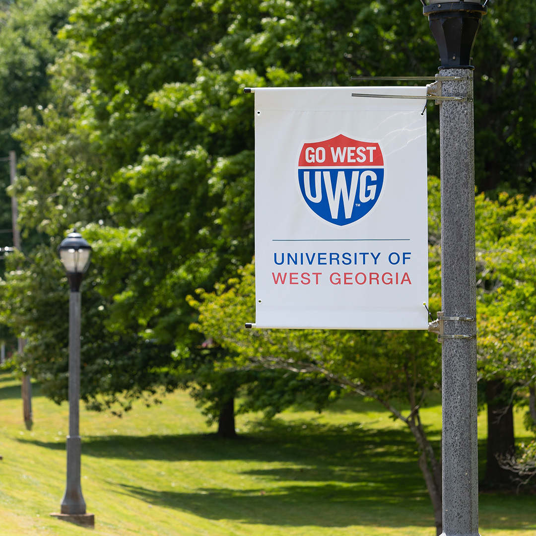 lamp post signage of the UWG shield