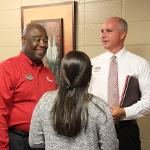 College of Business faculty chat with CFA Franchisee, David Daniels.