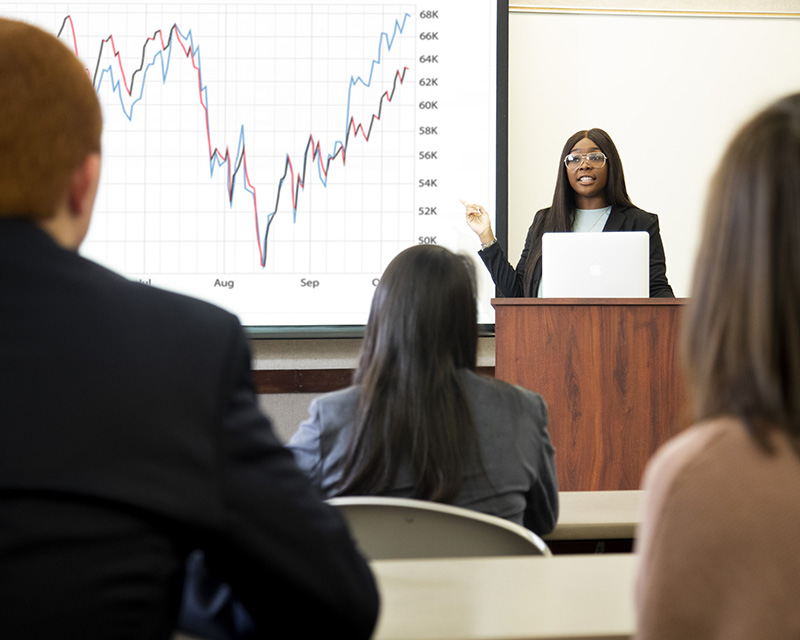 Student presenting in front of class