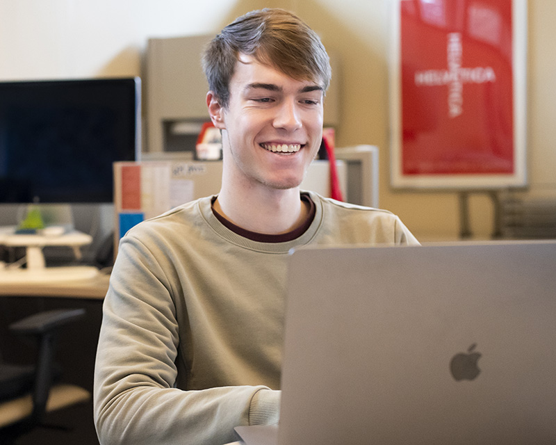 Student working at a laptop