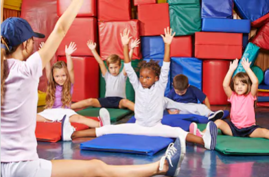 teacher helping kids stretch