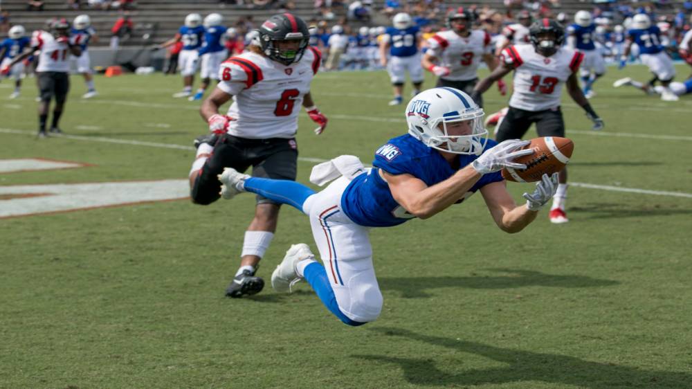 UWG Football player catching a football during a game