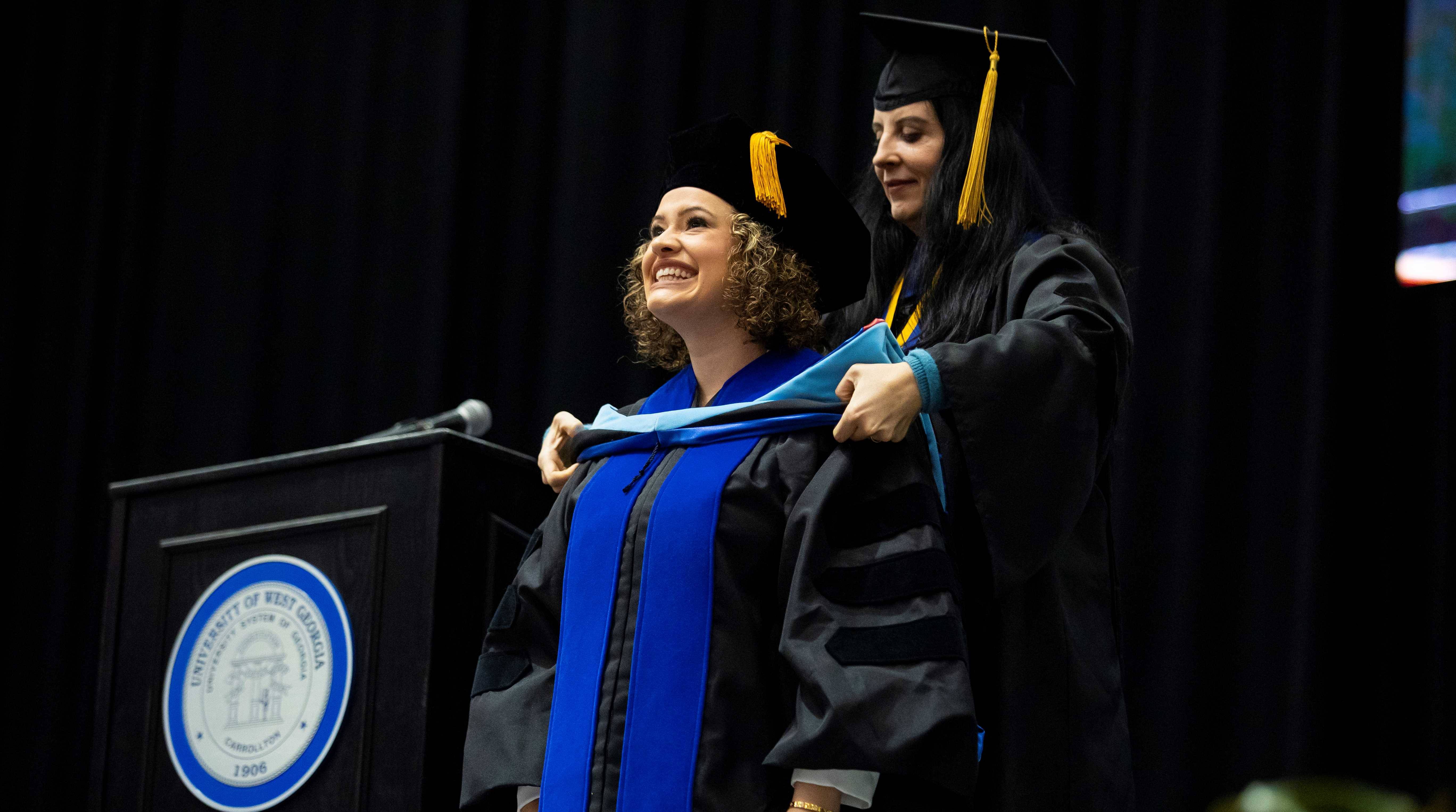 student receiving doctoral hooding