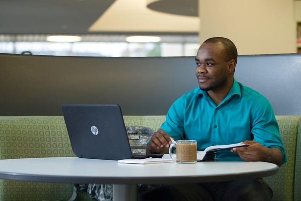 Student studying at the library