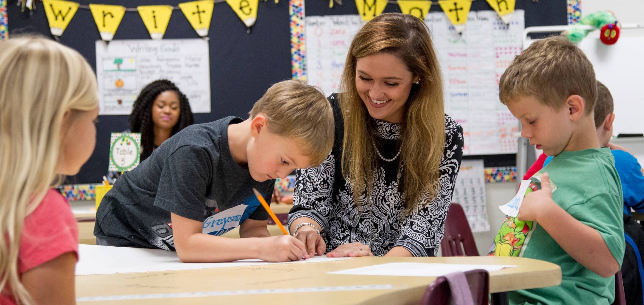 Teacher with students