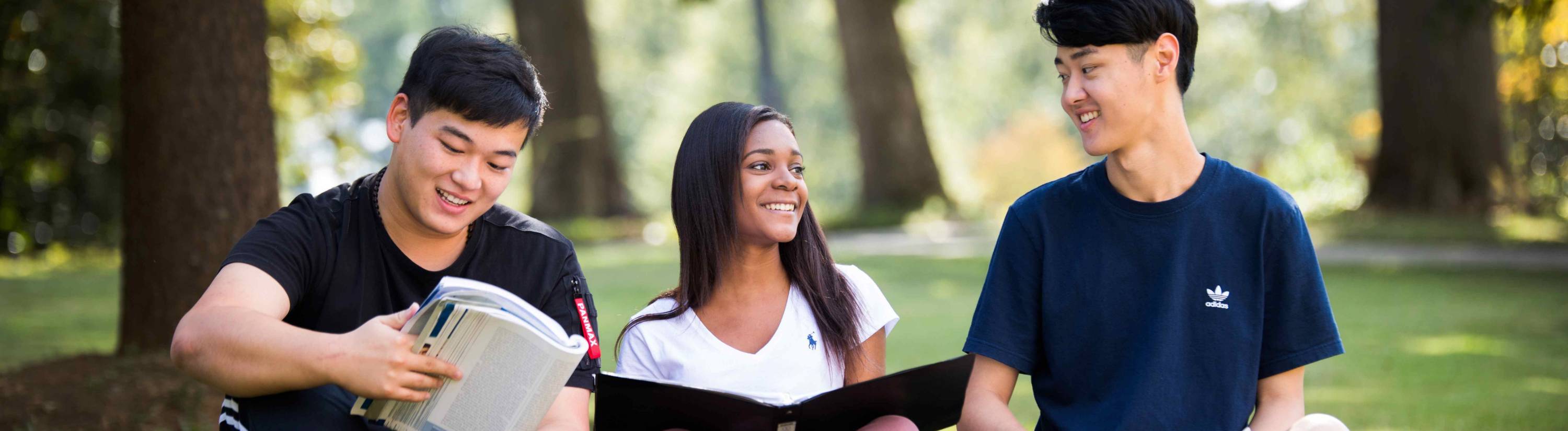 Students sitting outside.