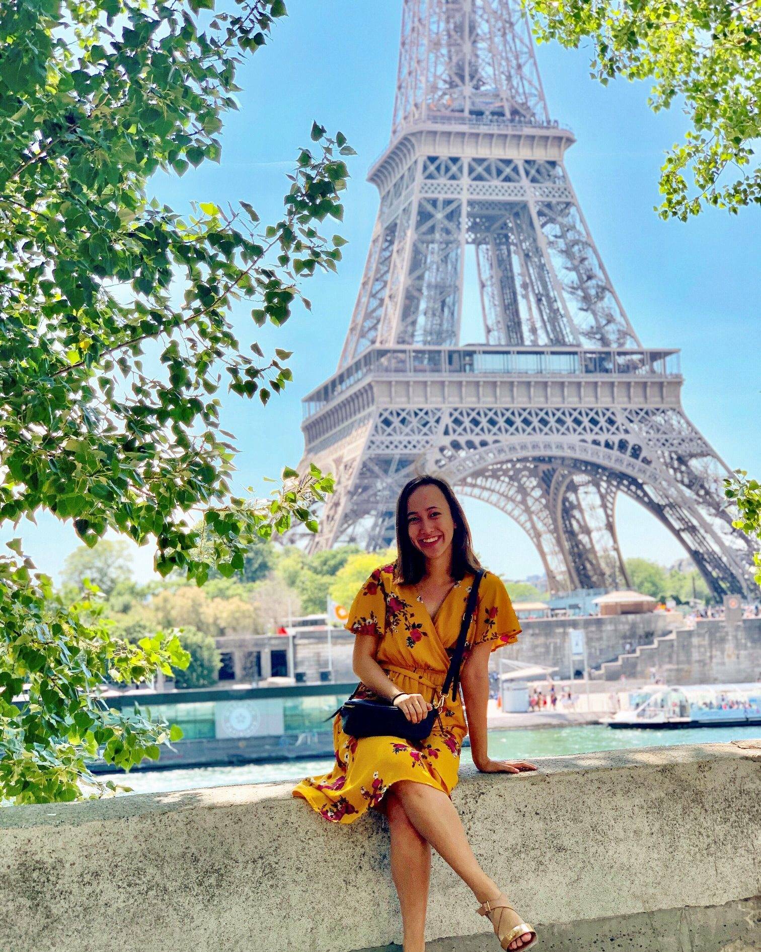 student in front of Eiffel Tower