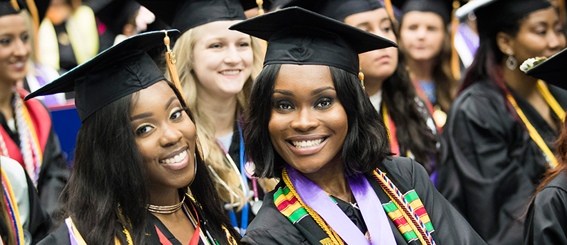 Female graduates at commencement