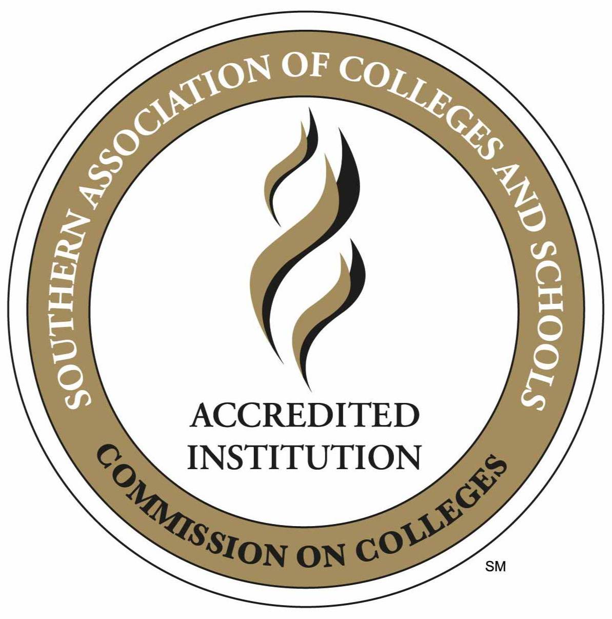 SACSCOC's Logo with a flame and Accredited Institution in the center, surrounded by the associations name within a gold circle.