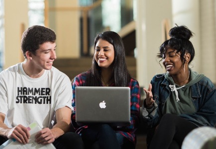 Three students talking