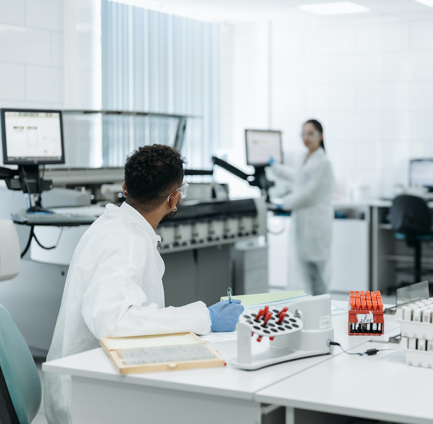 Two people working in a science lab