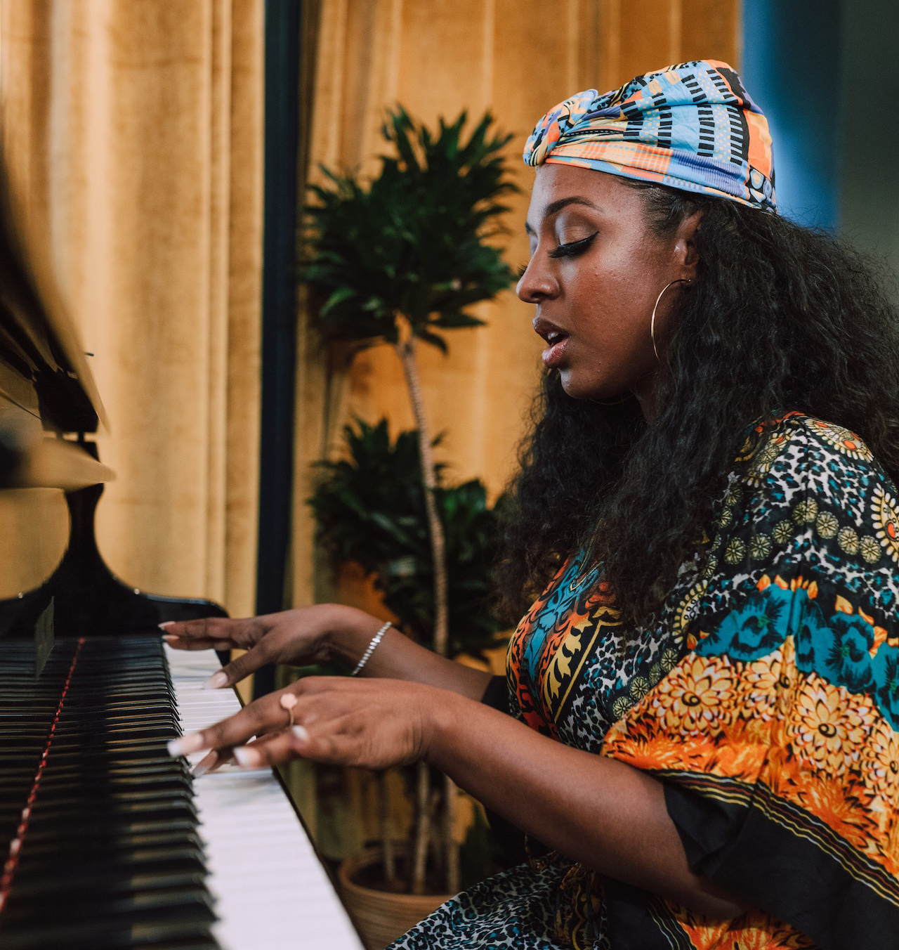 Photo Of Woman Playing Piano