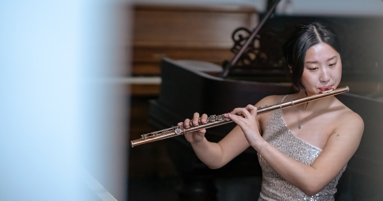 Woman playing the flute