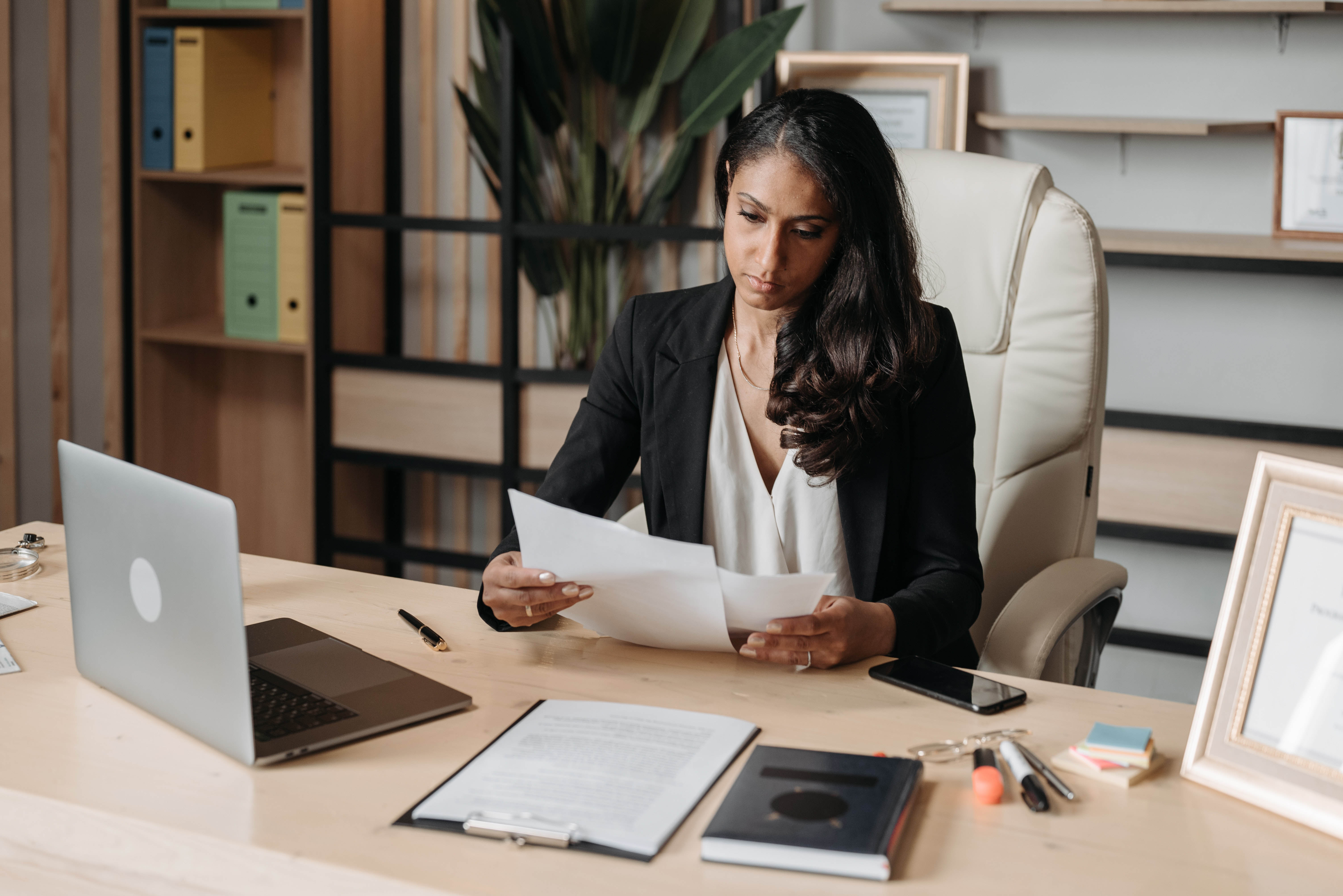 Woman looking a papers