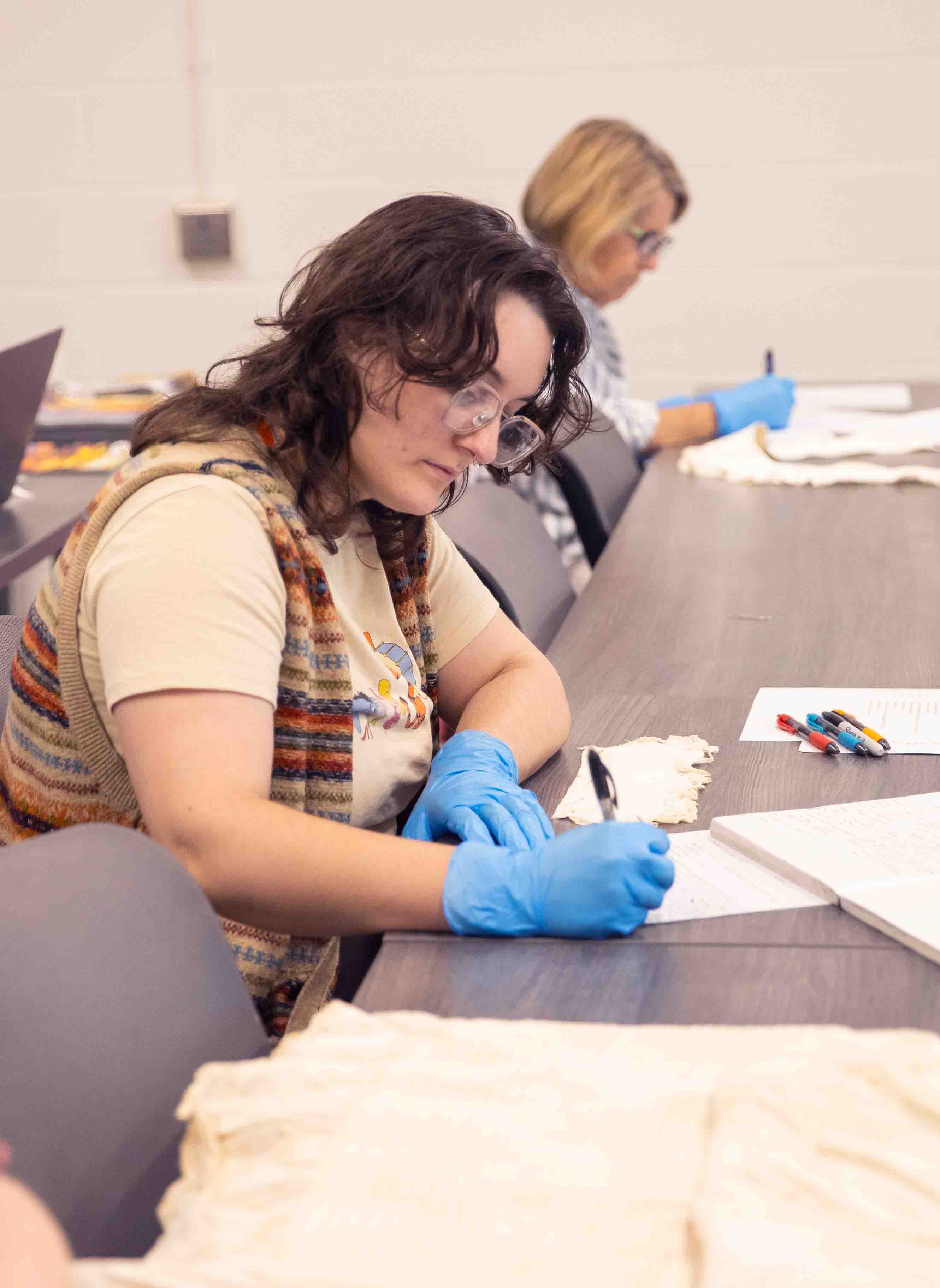 Student working on a textile piece