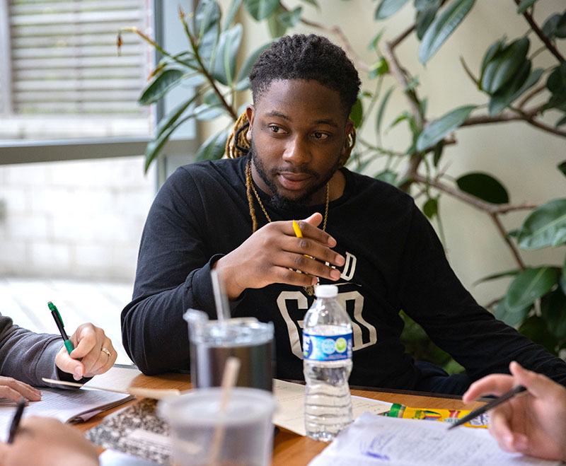 male student studying