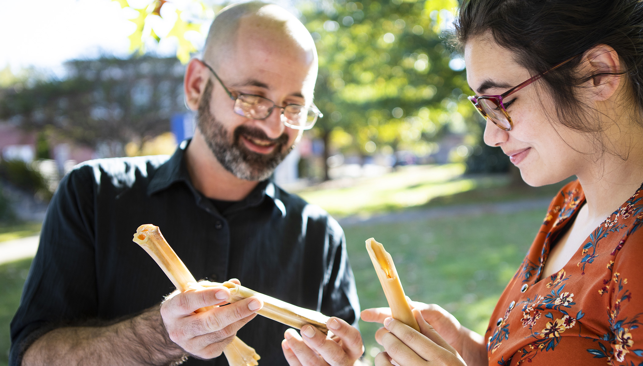 student studying bones