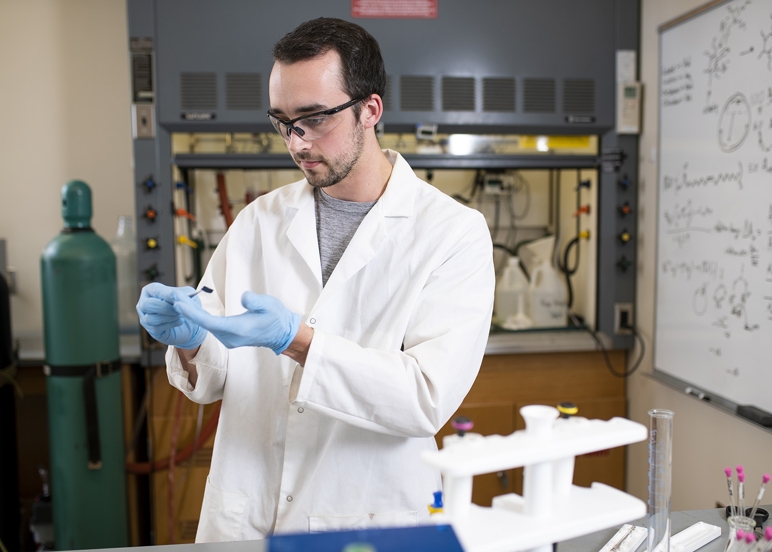 male student in a lab