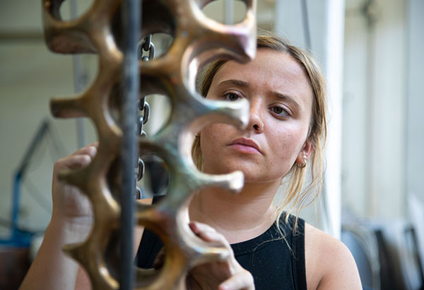 student working in sculpture workshop