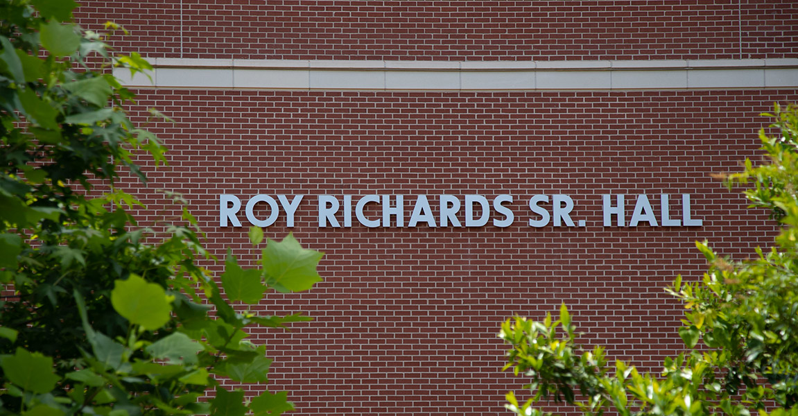 Roy Richards Sr. Hall sign on building.