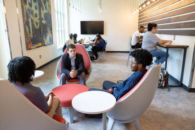 students sitting in innovation lounge