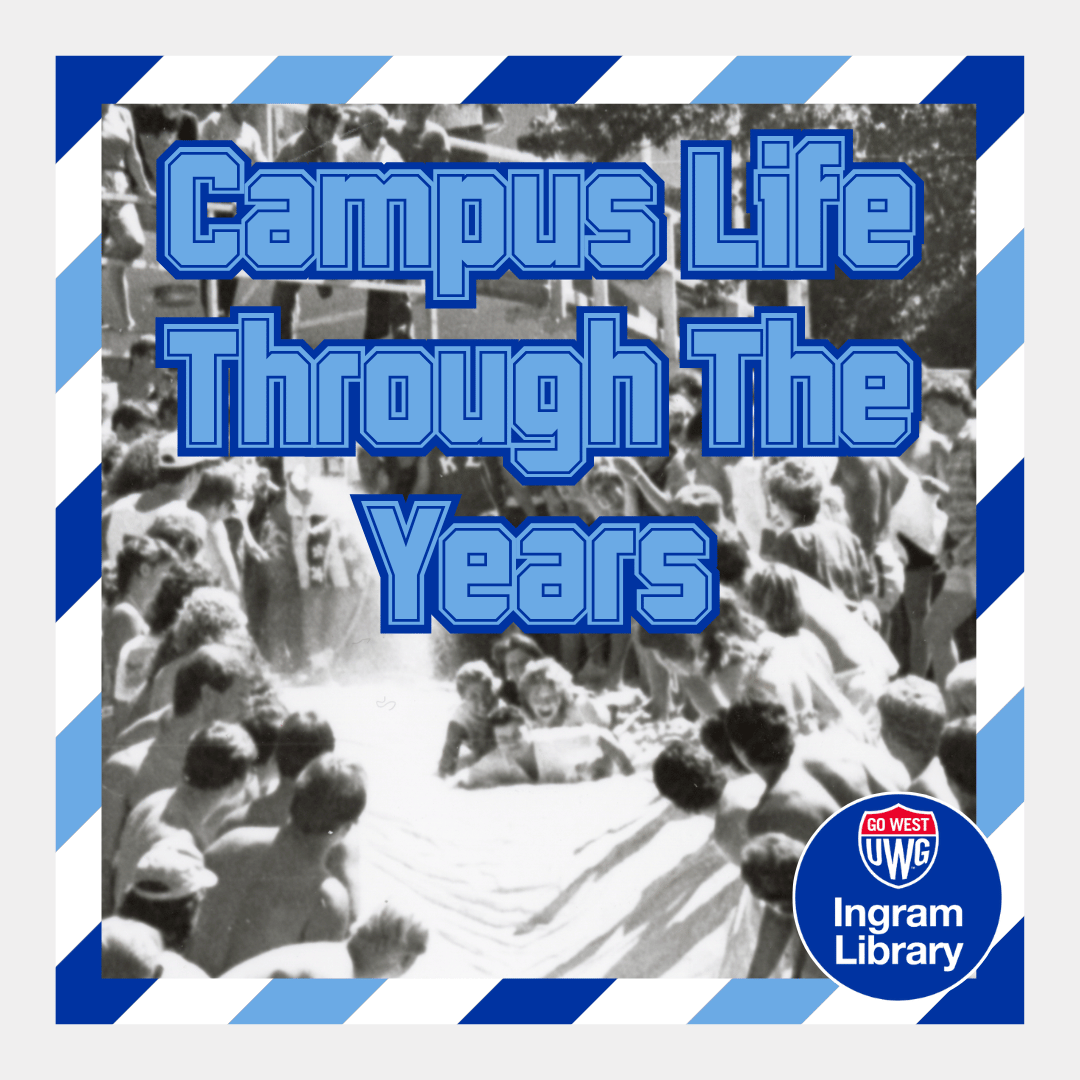 An '80s era picture of students going in a pile down a slip and slide