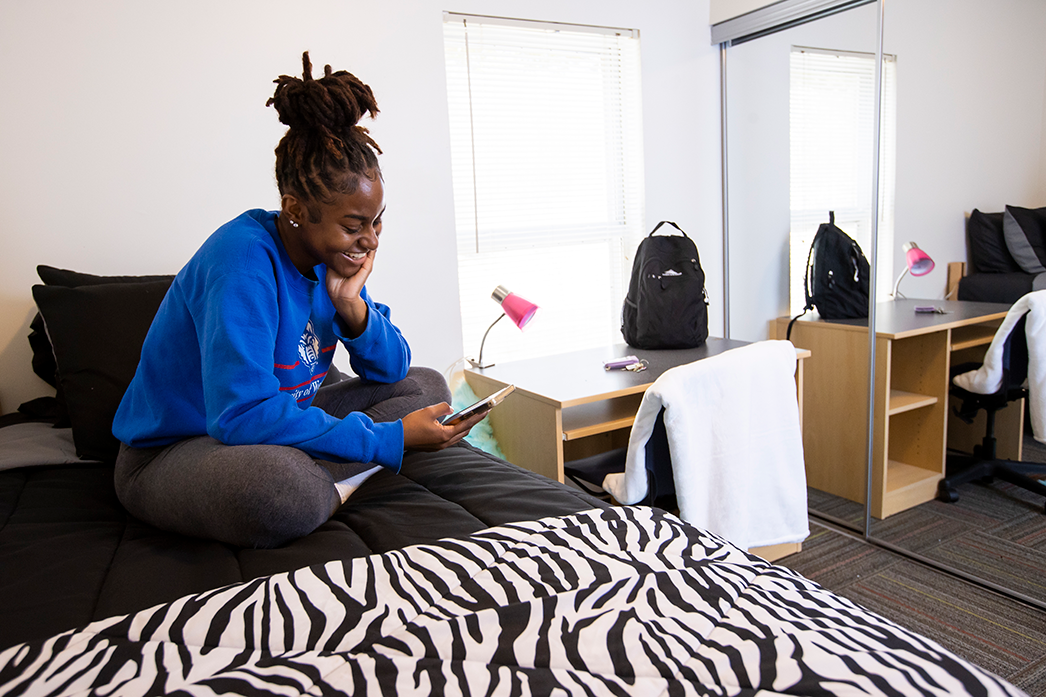 Student in res hall room