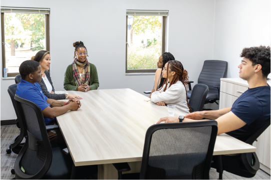 Group of students at a conference room