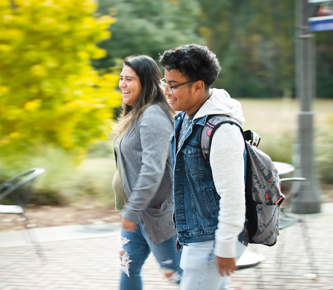 students walking past outdoors
