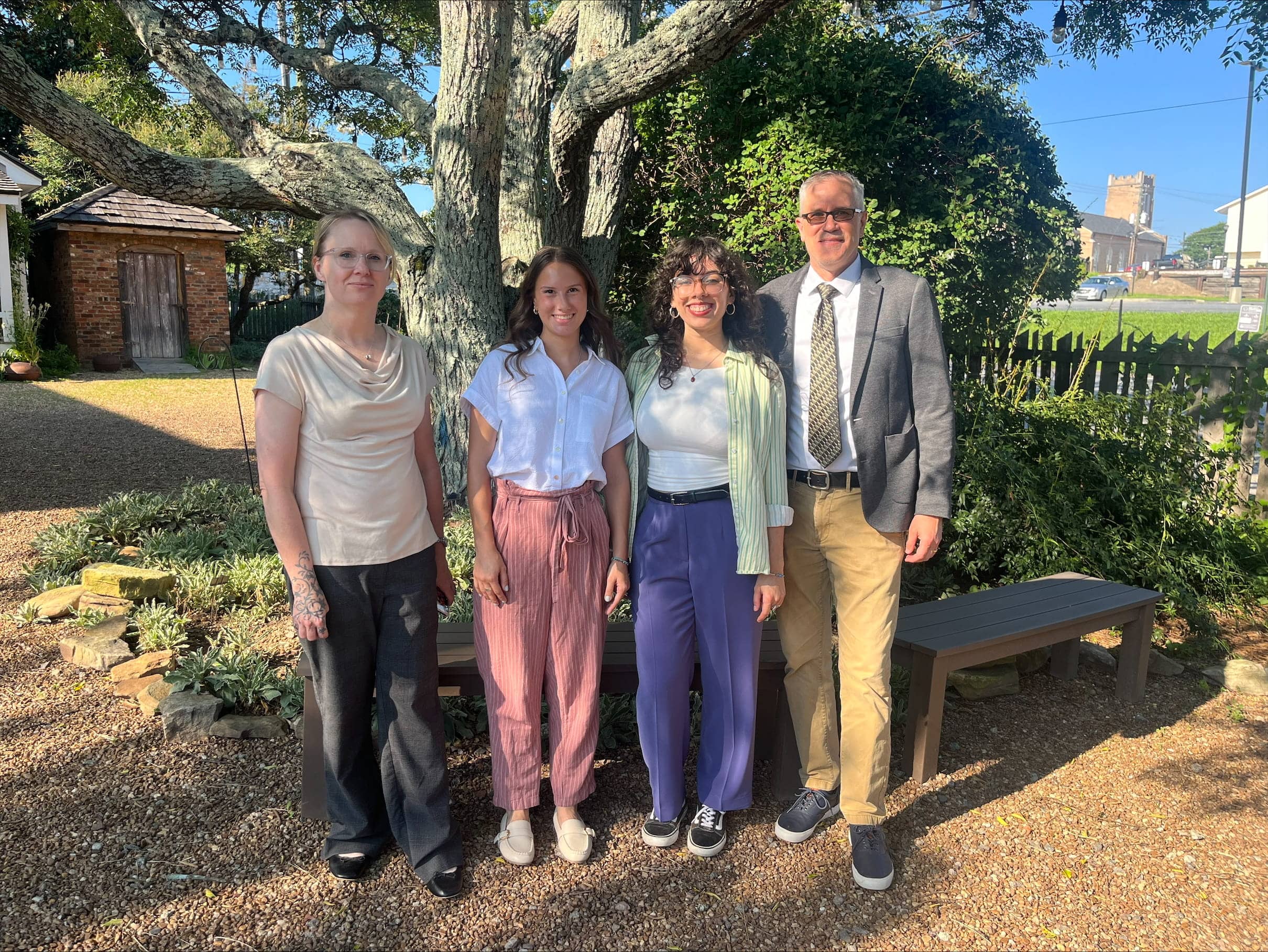 Professors Dr. Georgina DeWeese and Dr. Andrew Ivester, and student interns Ellie Hobson and Ana dos Santos