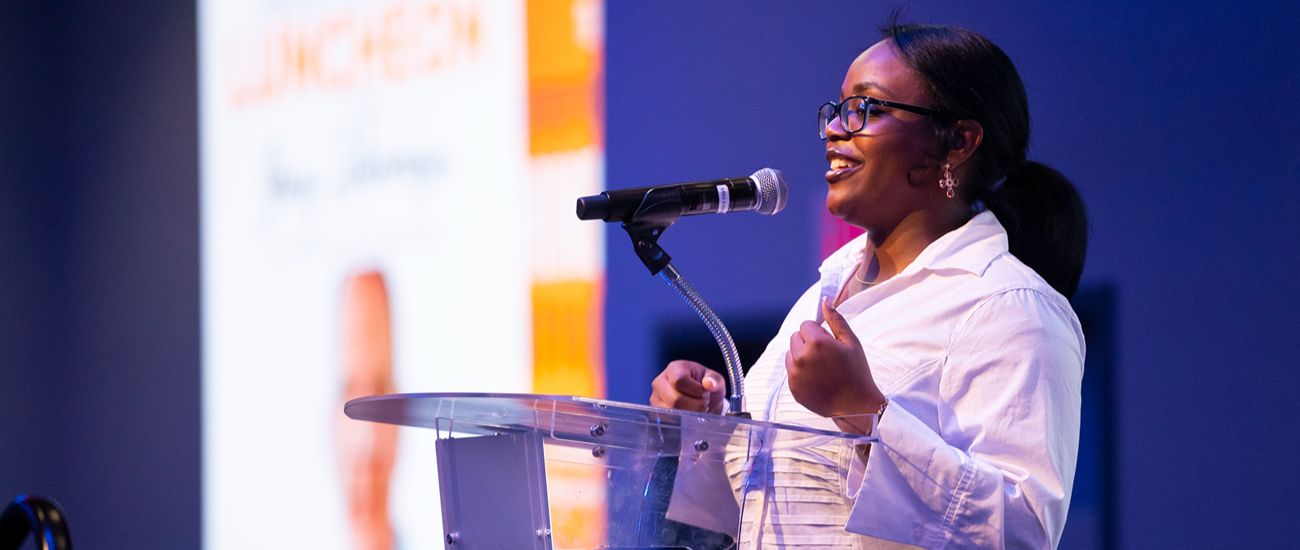 woman presenting at an event