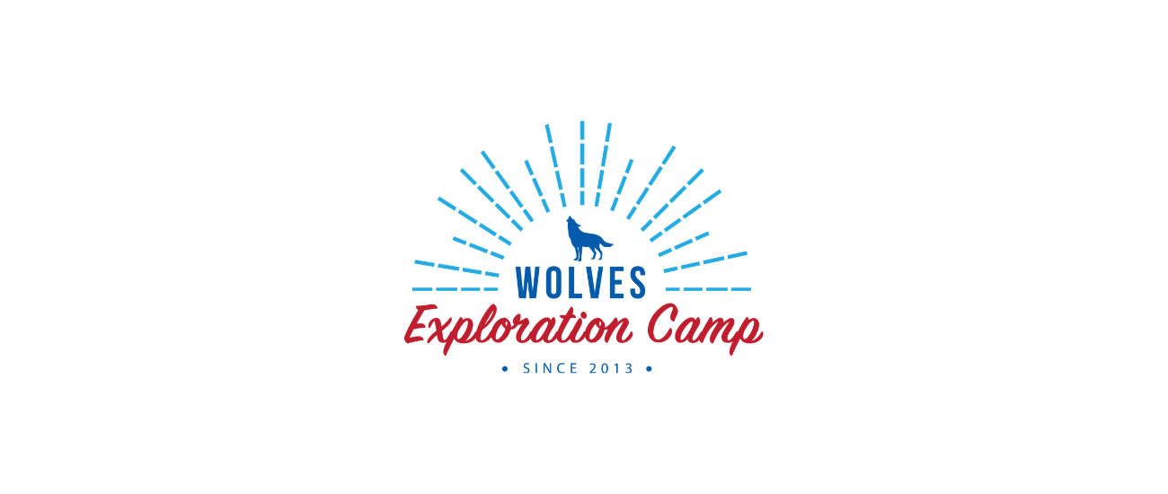 Centered in the middle of the jumbotron is the Wolves Exploration Camp Logo with wolf and sun graphics and text Wolves Exploration Camp Since 2013.