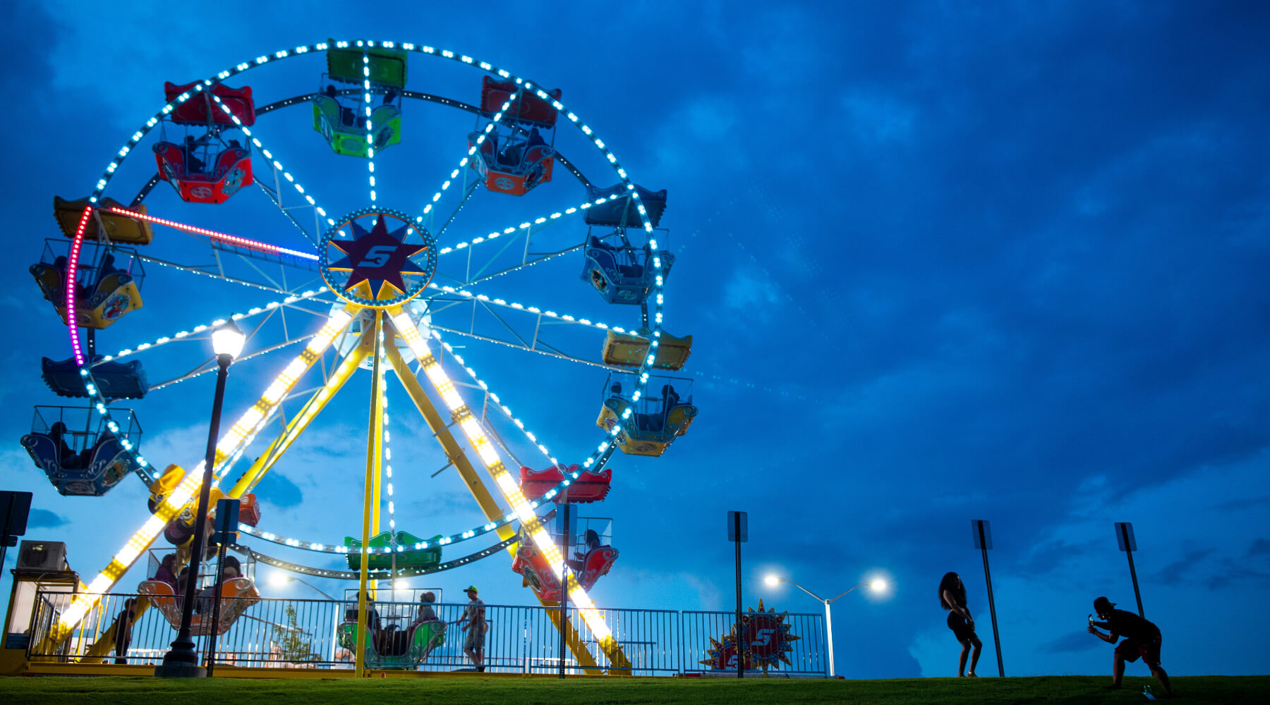 students riding the ferris wheel