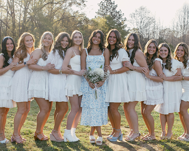 fraternity and sorority students in greek village