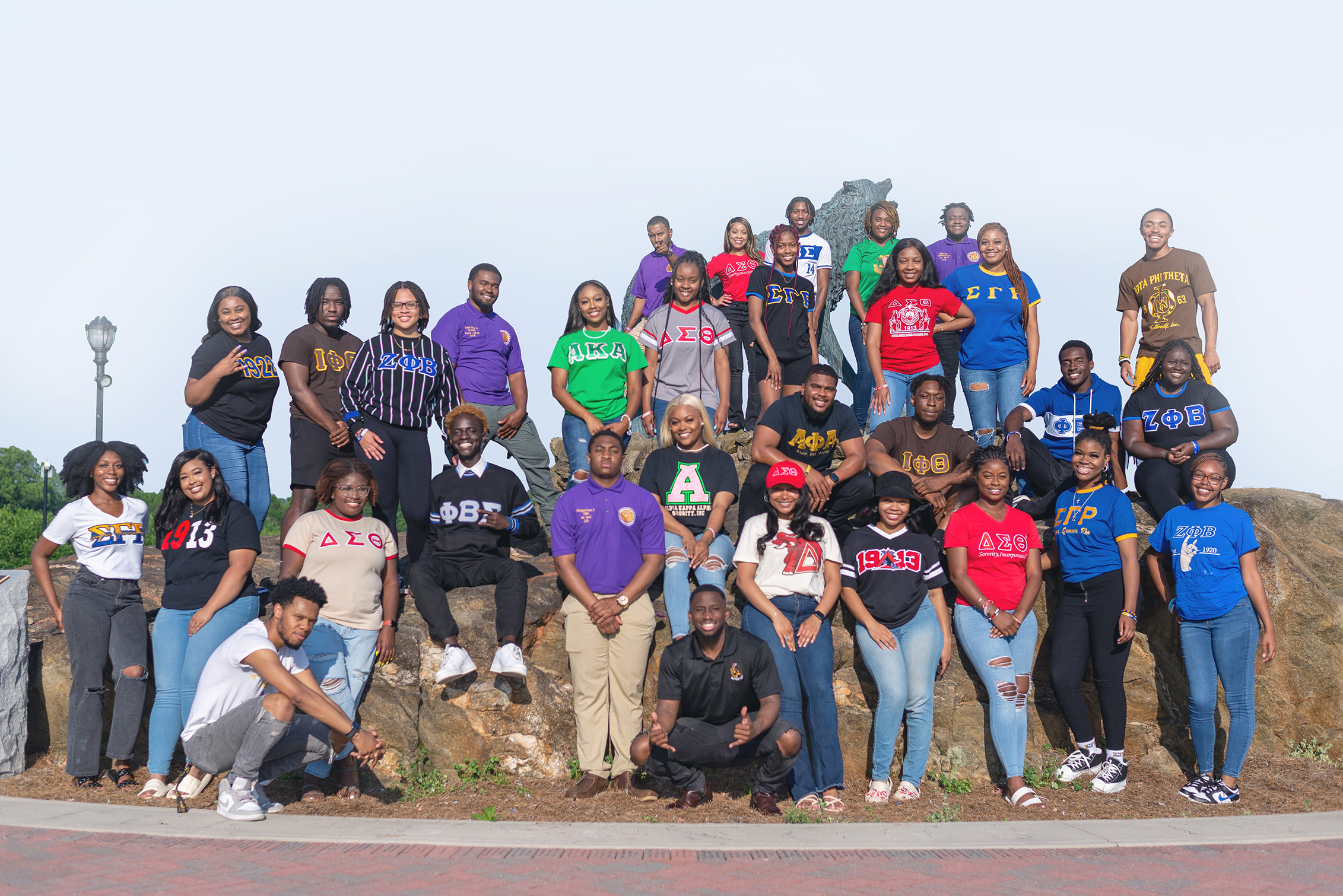 fraternity and sorority students in greek village