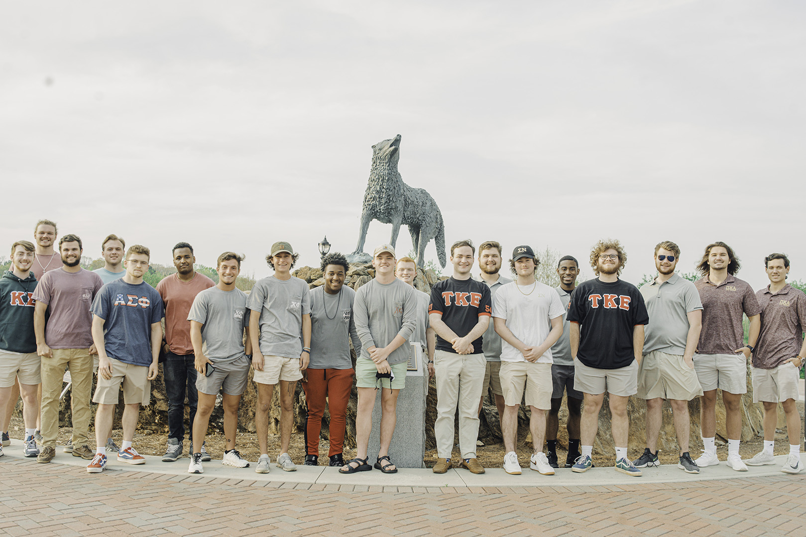 fraternity and sorority students in greek village