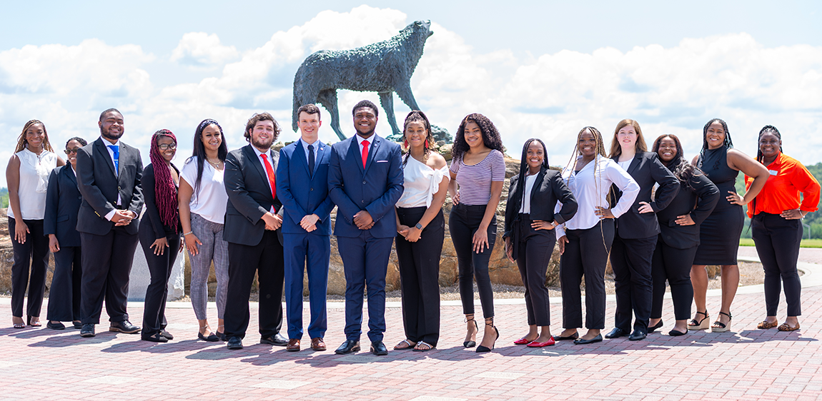 SGA students standing together in front of wolf plaza.