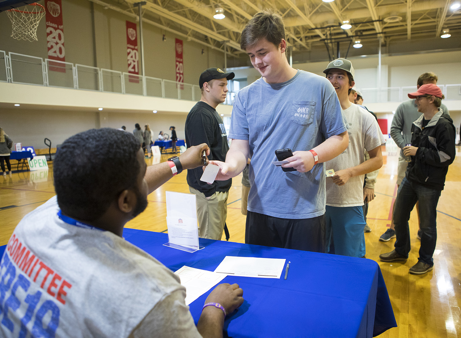 Students signing up for volunteer opportunities in the Campus Center