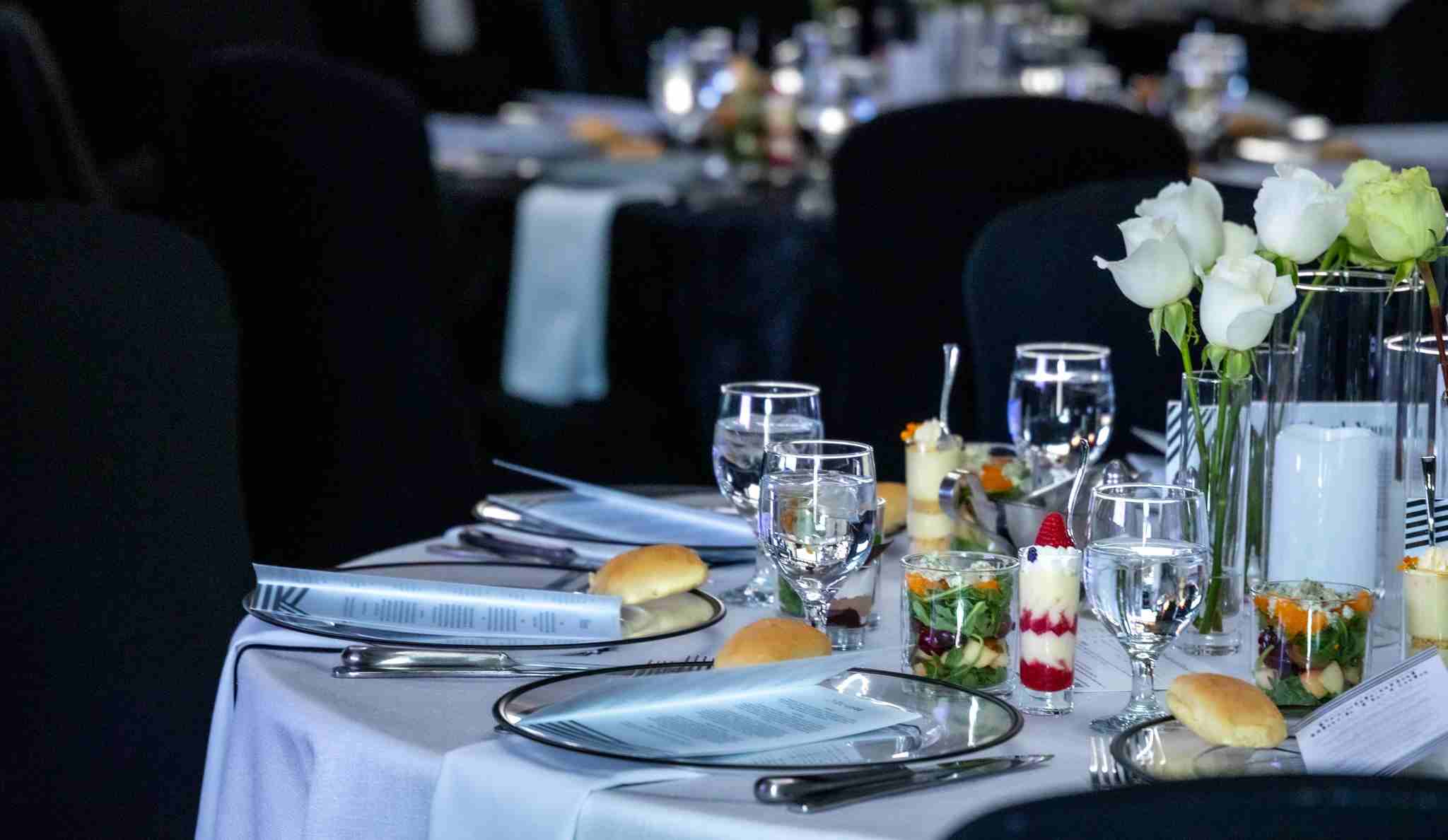 Drinks and fancy food on table