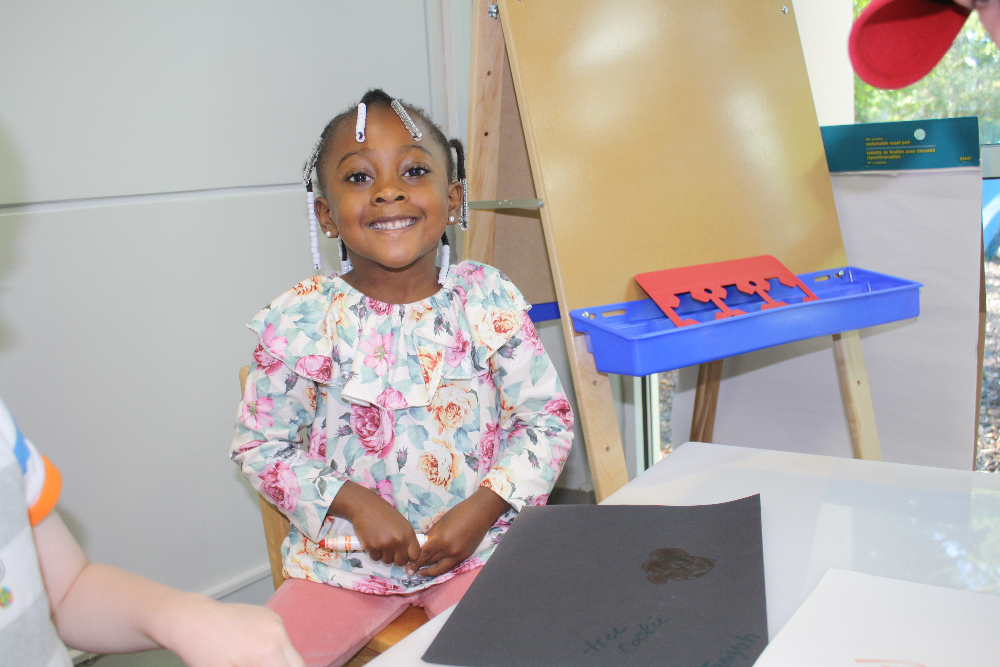 Pre-K Student working on a makerspace activity