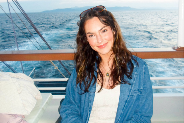 women on a sail boat in the ocean