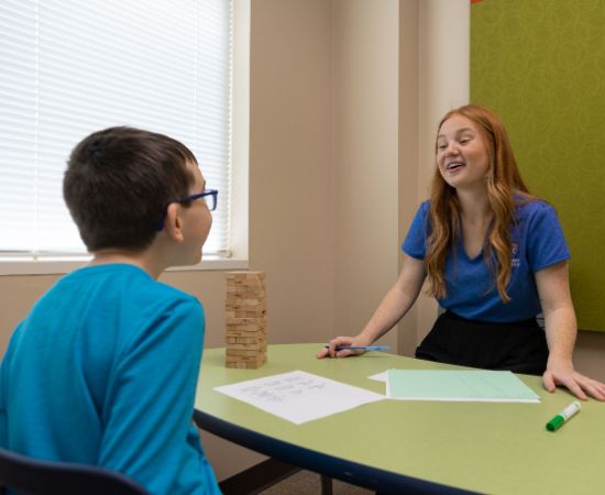 Clinic worker with student