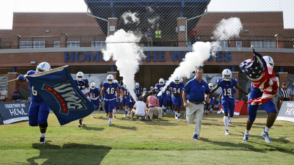 UWG Football player catching a football during a game