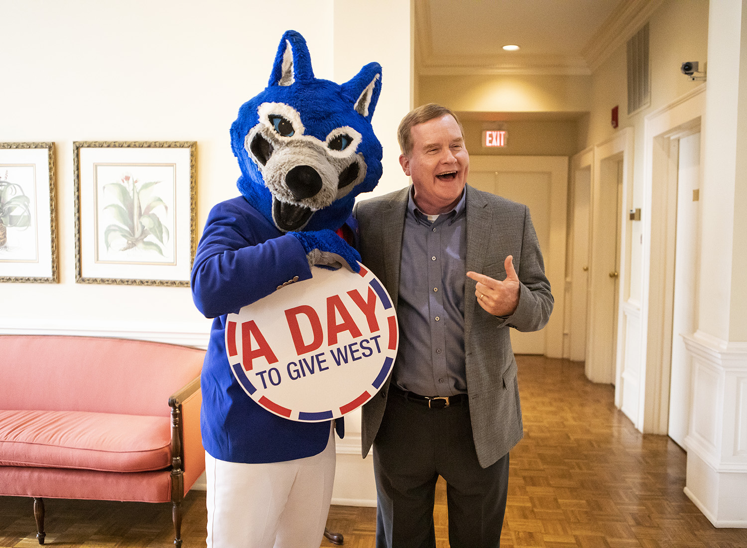 Wolfie with local business owner