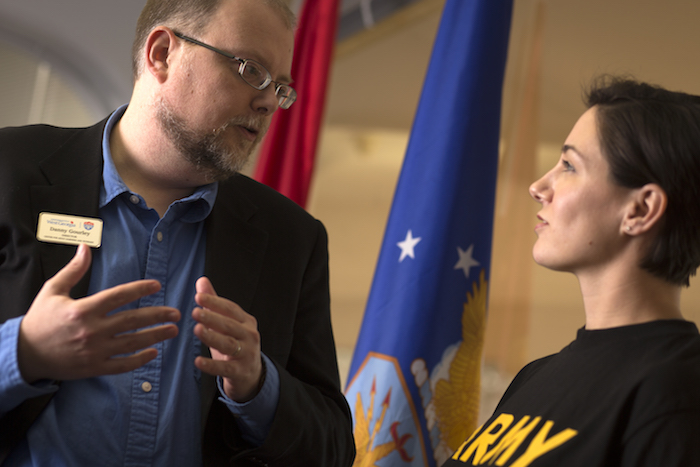 students talking to a counselor