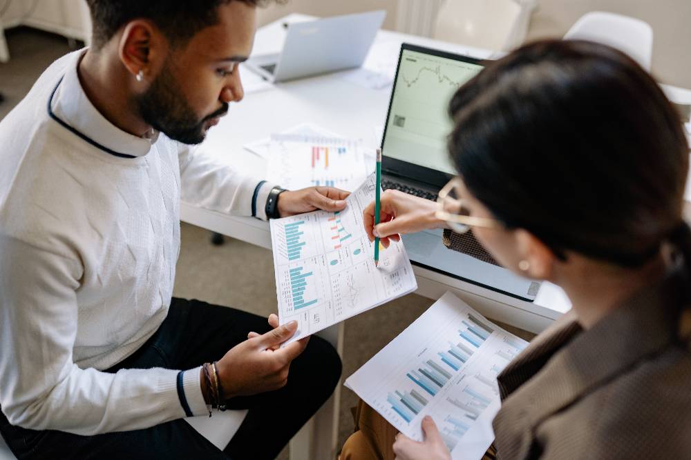 two people looking at data