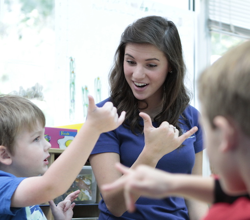 student teacher working with students