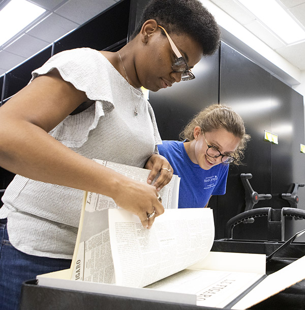 students looking at papers in Atlanta History Center