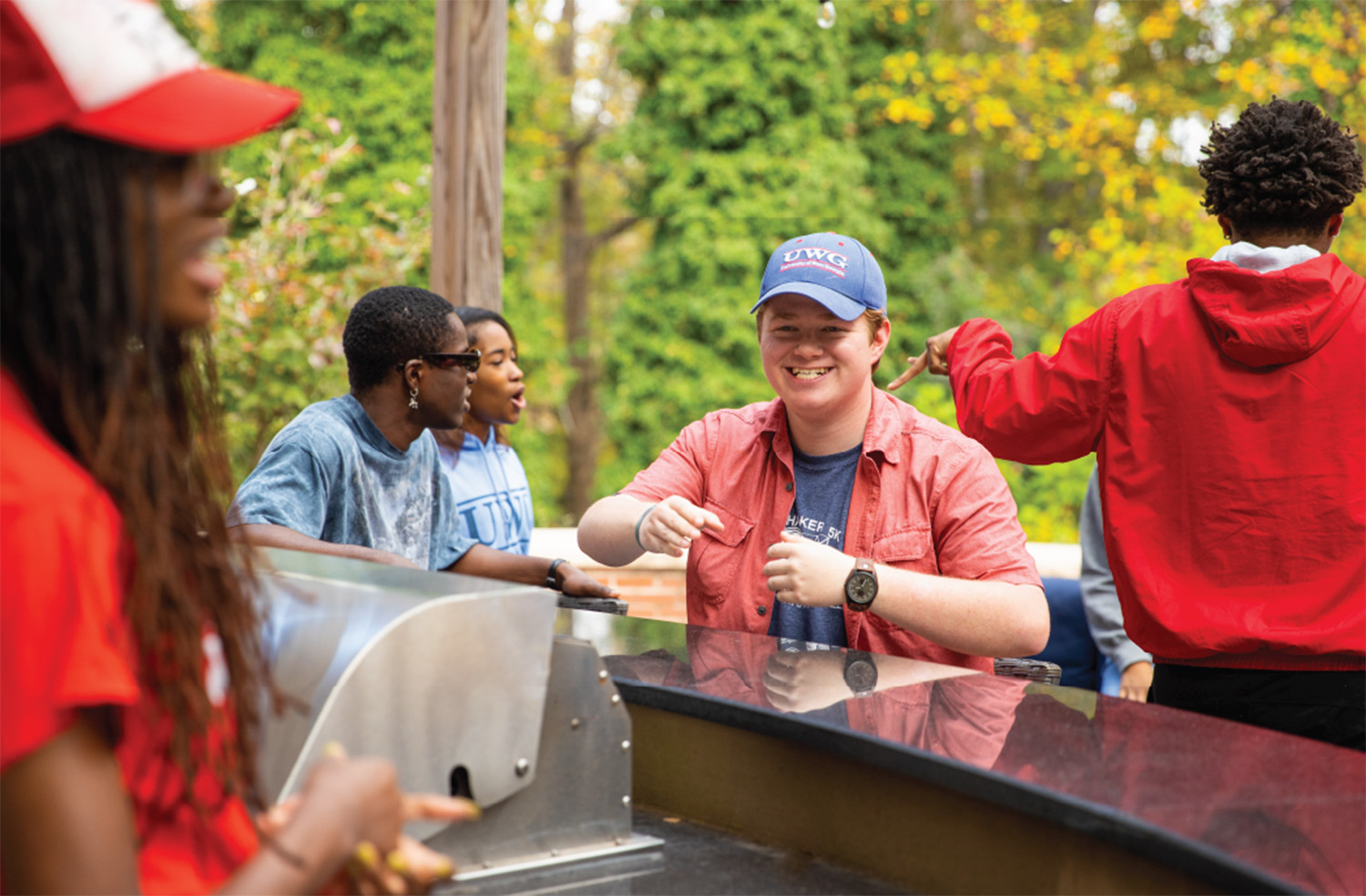 Students enjoying sunshine at CPS grill