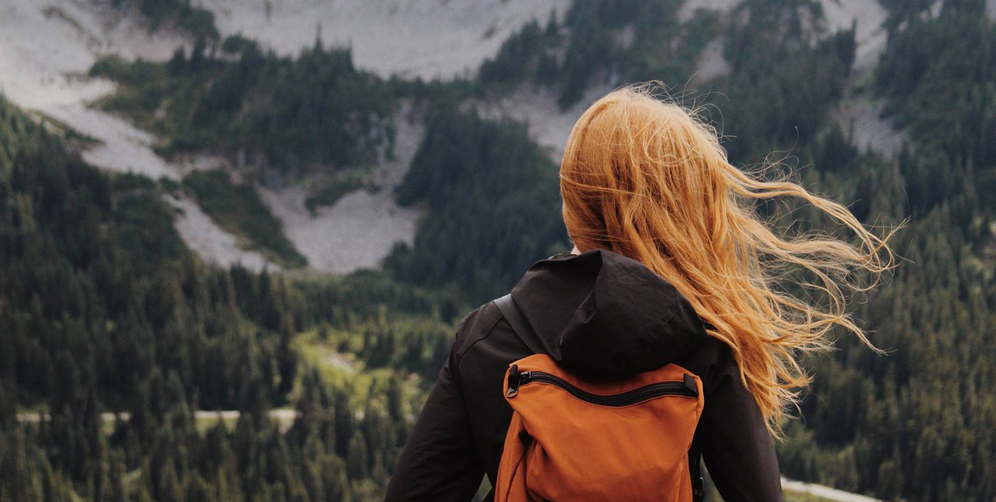 back of female student's head with mountains in background